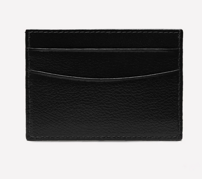 The Ettinger Capra Flat Credit Card Case features black grainy leather, two card slots, and visible edge stitching, combining style and durability.
