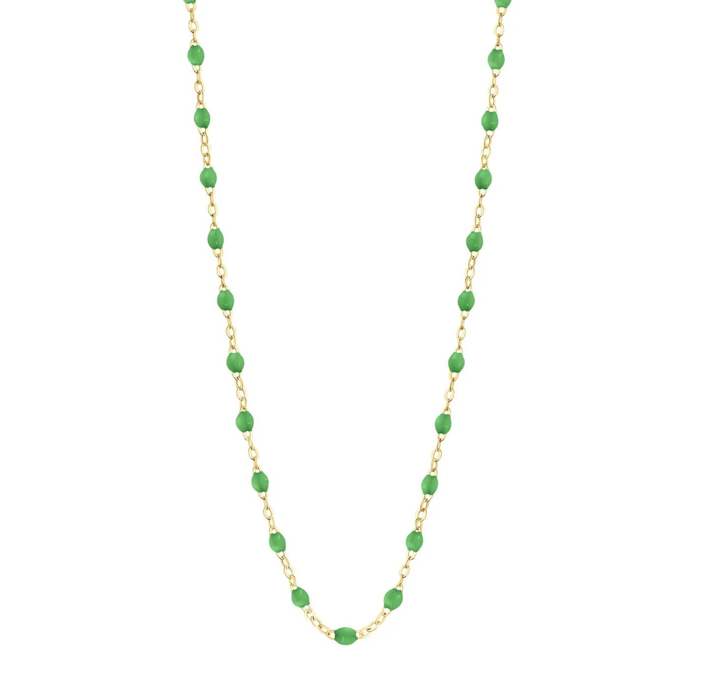 The Gigi Clozeau Classic Gigi Necklace 19.7" boasts a refined 18-carat yellow gold chain enhanced with small green beads, capturing the enduring sophistication characteristic of Gigi Clozeau's creations.