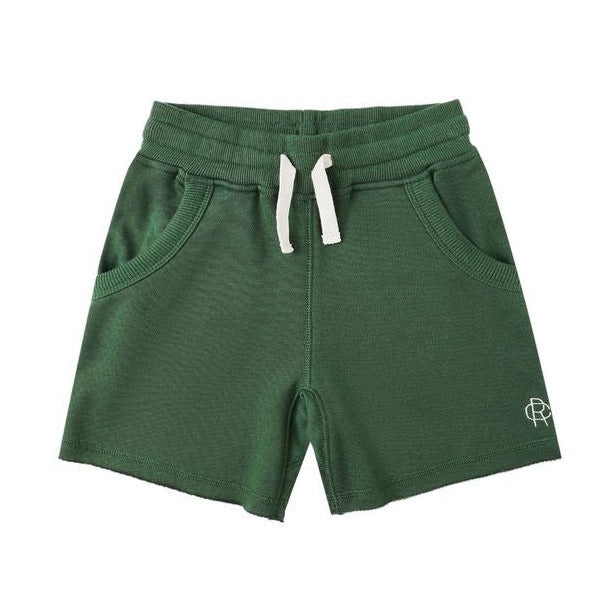 The Rylee & Cru Boys' Ventura Short features a green elastic waistband with white drawstring, raw edge details, two side pockets, and a small white logo on the left leg.