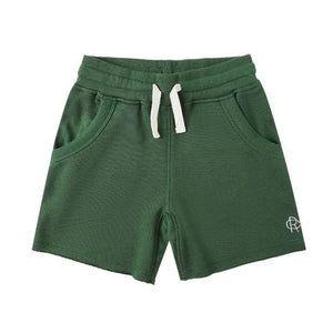 The Rylee & Cru Boys' Ventura Short features a green elastic waistband with white drawstring, raw edge details, two side pockets, and a small white logo on the left leg.