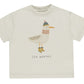 The Rylee & Cru Baby Boys' & Boys' Relaxed Tee is a beige, soft cotton jersey basic featuring a bird in a hat, scarf, and boots with "SEA WORTHY" printed underneath; available in baby sizes.