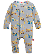 The Magnetic Me Baby Boys’ Doze Off Convertible Coverall features a gray design adorned with yellow construction vehicles like excavators and bulldozers. Made from soft, sustainable modal fabric, this coverall offers convertible styling and convenient front snaps for easy closure.