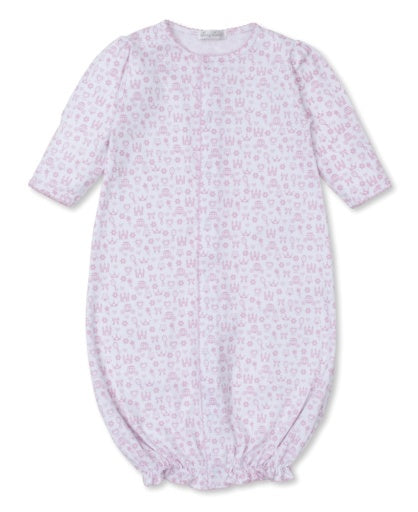 The Kissy Kissy Baby Royal Details Pink Convertible Gown is a light pink Pima cotton gown with long sleeves, elastic hem, and a subtle print on white—ideal for baby's comfort and versatile wear.