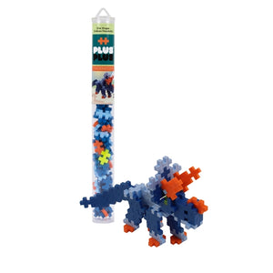 The Plus-Plus Tube - Triceratops features an assembled blue and orange dinosaur model beside the tube, providing creative play that supports fine motor development and serves as a fun STEM toy.