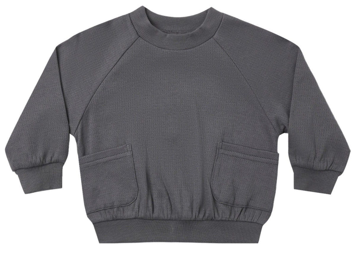The Quincy Mae Baby Boys’ and Boys’ Pocket Sweatshirt in gray features long sleeves, a crewneck, ribbed cuffs and waistband, and two front pockets, shown laid flat on a white background.