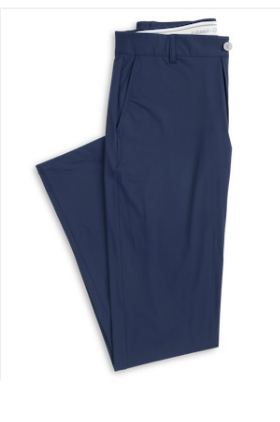 A pair of neatly folded Johnnie-O Fusionn Pant performance trousers in navy blue, featuring belt loops, side pockets, a stretch waistband, and a visible button closure at the waist.