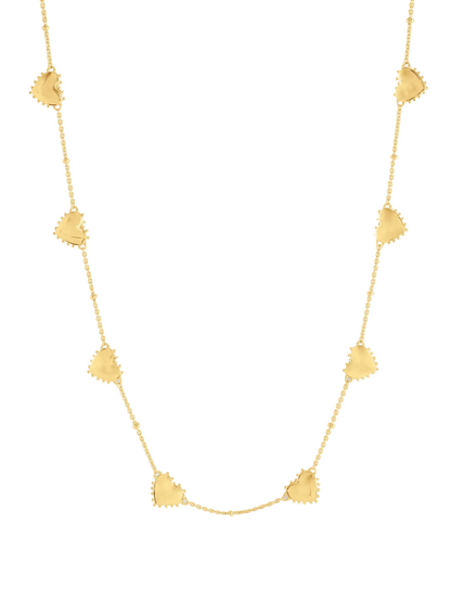 Anabel Aram Heart Station Necklace featuring an 18k gold plated chain with six evenly spaced puffy heart charms with beaded borders.