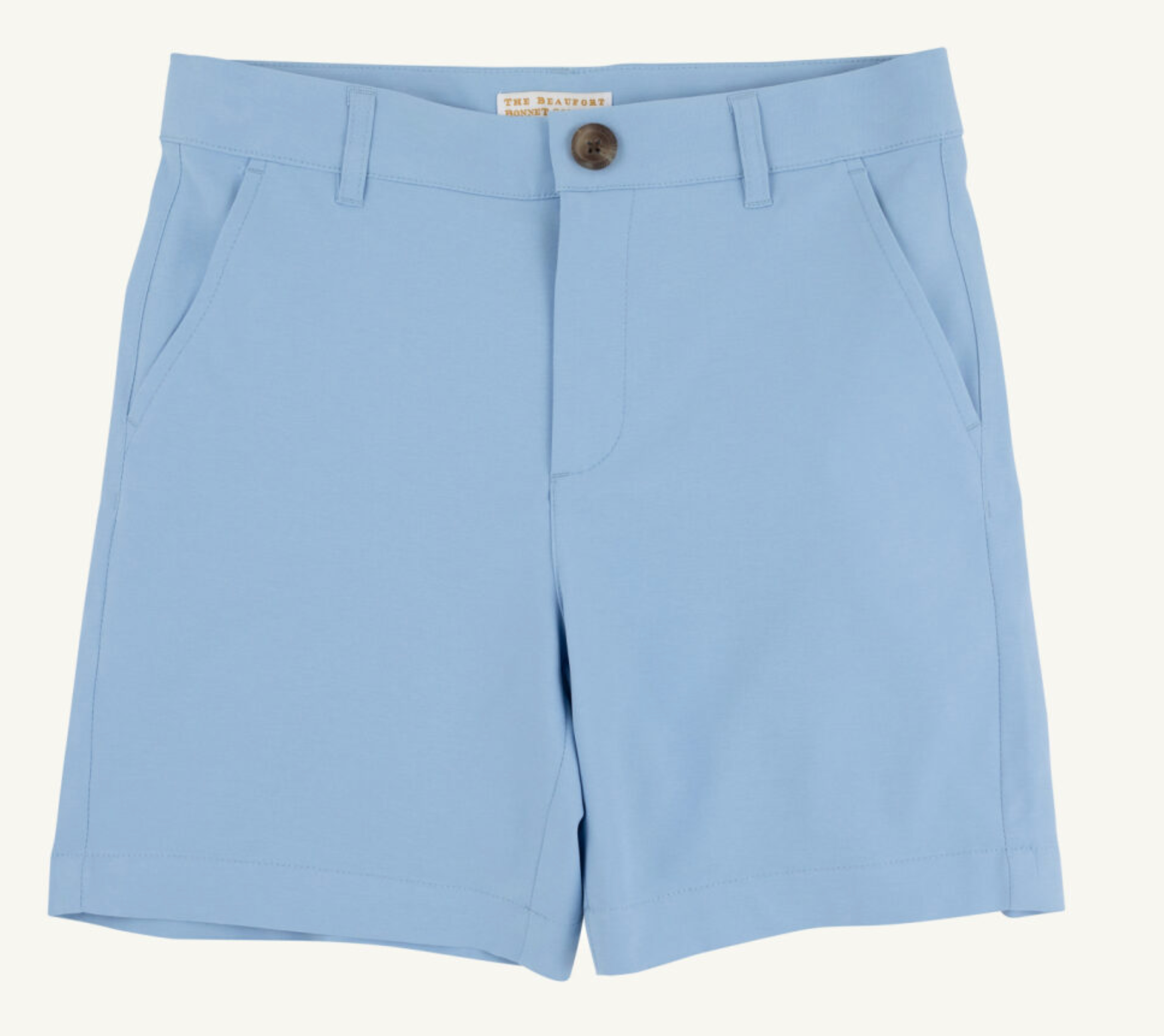The Beaufort Bonnet Company Boys' Prepletic™ Charlie's Chinos shorts in light blue feature front pockets, button closure, belt loops, cuffed hems, and performance fabric, shown laid flat on a plain background.