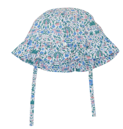 The Tartine et Chocolat Baby Girls’ Country Club Hat is crafted from breathable cotton and features a charming blue, green, and pink floral print. Designed with a wide brim and two chin straps for a secure fit, this summer hat is shown against a white background.