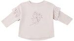 The Quincy Mae Baby Girls’ and Girls’ Ruffle Long Sleeve Tee is a cozy everyday essential, featuring a light pink hue, charming ruffled shoulders, and a delicate line drawing of flowers tied with a bow on the front.