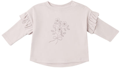 The Quincy Mae Baby Girls’ and Girls’ Ruffle Long Sleeve Tee is a cozy everyday essential, featuring a light pink hue, charming ruffled shoulders, and a delicate line drawing of flowers tied with a bow on the front.