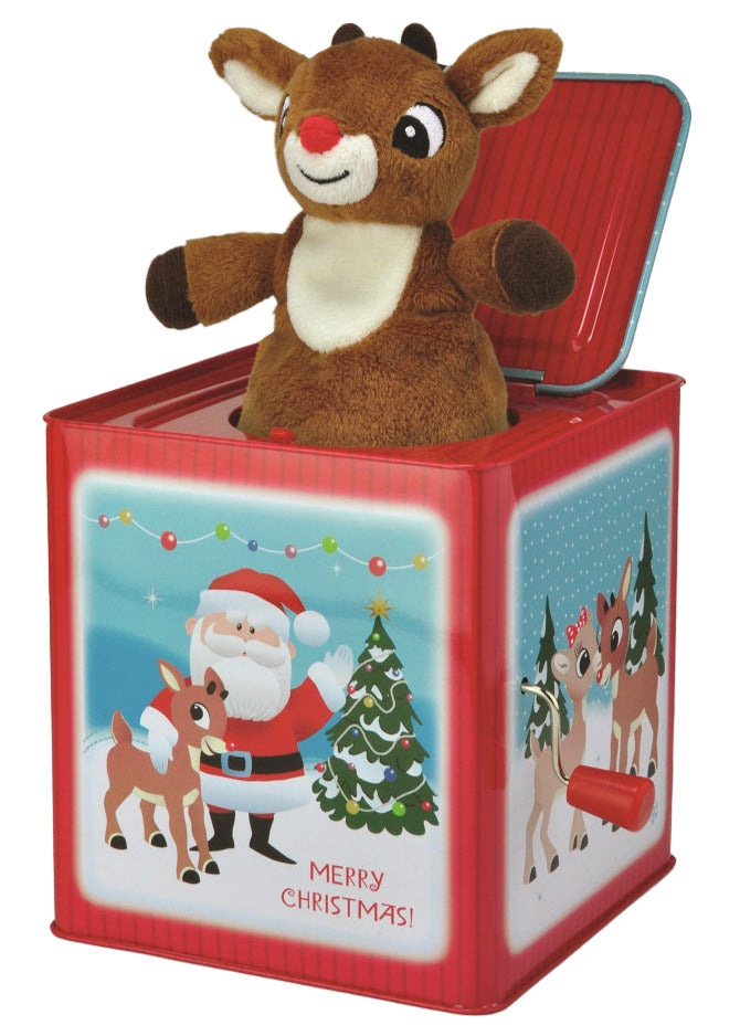 The Kids Preferred Rudolph Jack in the Box features a plush Rudolph popping out of a festive red box adorned with Santa, a Christmas tree, and reindeer—making it a charming holiday surprise toy.