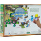 A person is holding a piece from the eeboo Land of Dinosaurs 100 Piece Puzzle by Eeboo next to its box, which captivates paleontology enthusiasts with its depiction of dinosaurs in their natural habitat and intriguing information about their ancient existence.