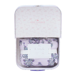 The Pink Chicken Nesting Box Baby Take Home Set features folded floral organic pima cotton fabric in a pastel chicken-patterned gift box with an info card, making it a perfect newborn gift.