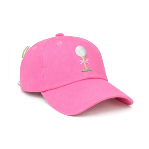 The Tee Time Bow Hat by Bits & Bows is a bright pink baseball cap adorned with a small embroidered balloon and bow on the front. Featuring a curved brim and ventilation eyelets, this hat is perfect for girls, offering excellent sun protection for kids—an ideal choice for golf or outdoor activities.