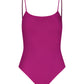 The lemlem Elene One Piece by Lemlem is a classic purple ribbed swimsuit with an interior shelf bra and adjustable spaghetti straps for a personalized fit, shown from the front.