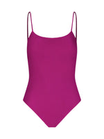 The lemlem Elene One Piece by Lemlem is a classic purple ribbed swimsuit with an interior shelf bra and adjustable spaghetti straps for a personalized fit, shown from the front.