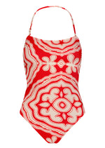 The lemlem Dinha One Piece by Lemlem is a red and beige swimsuit with an abstract floral pattern, featuring a sleek neckline and high-cut leg for a chic silhouette.