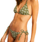 A person wears the Lemlem Malia Top and Rekka Bottom Bikini, featuring a vibrant green with white floral patterns. The chic halter-neck top pairs effortlessly with adjustable string-tie bottoms for a perfect fit.