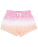 The Feather 4 Arrow Girls’ Weekend Short features a pink and peach ombré terry cloth design with an elastic waist and white drawstring, making it a stylish beach cover-up, shown here on a white background.