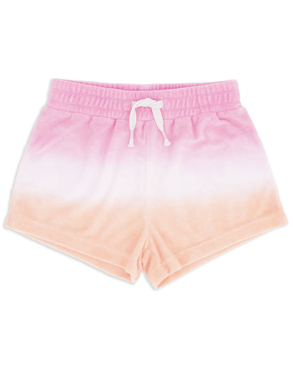 The Feather 4 Arrow Girls’ Weekend Short features a pink and peach ombré terry cloth design with an elastic waist and white drawstring, making it a stylish beach cover-up, shown here on a white background.