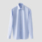 A Contemporary Houndstooth Fine Twill Shirt by Eton, featuring long sleeves and a button-up collar, is displayed on a plain light gray background.