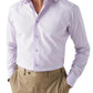 A man in an Eton Contemporary Light Purple Checked Stretch shirt.