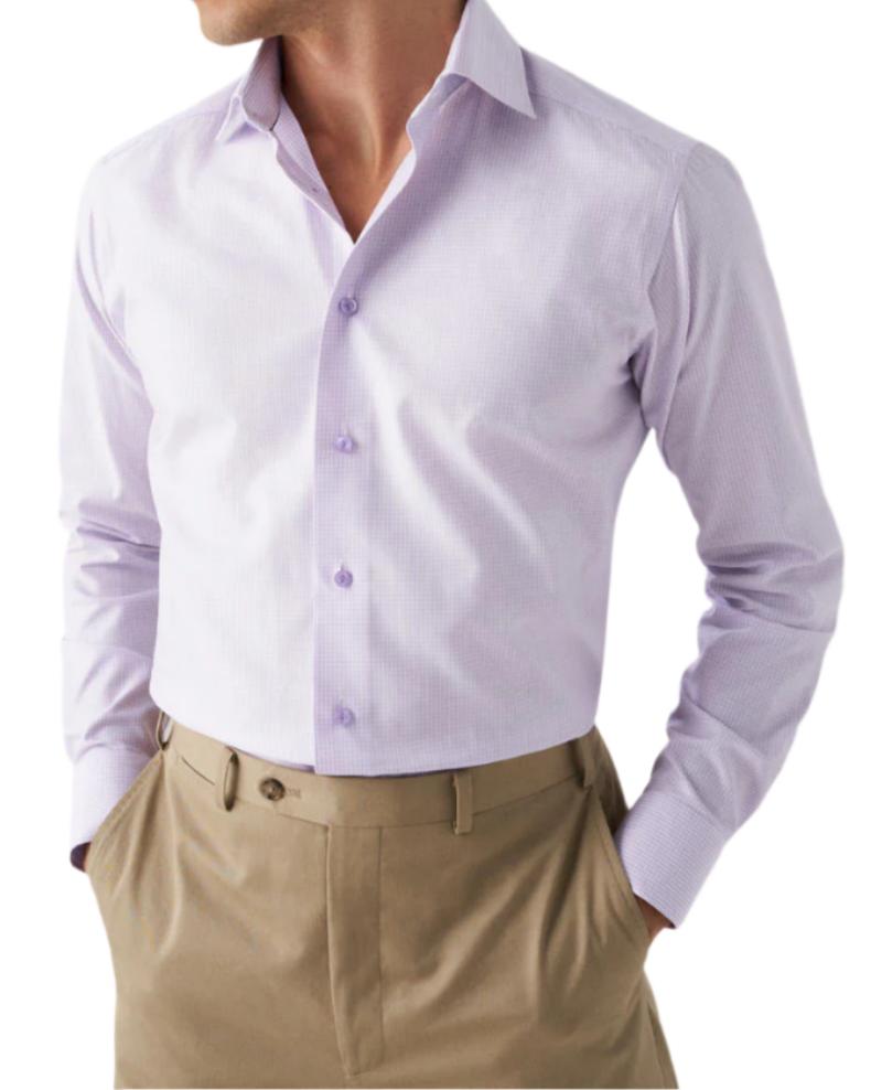 A man in an Eton Contemporary Light Purple Checked Stretch shirt.