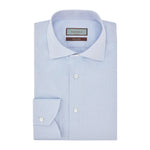 Canali Impeccabile Regular Fit Shirt in light blue, a long-sleeved dress shirt in cotton with a spread collar and buttoned cuffs, folded flat.