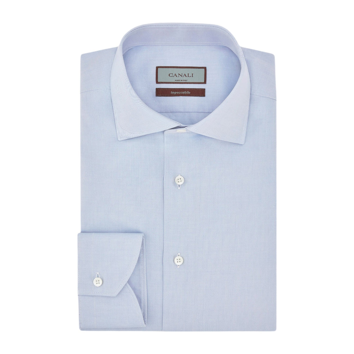 Canali Impeccabile Regular Fit Shirt in light blue, a long-sleeved dress shirt in cotton with a spread collar and buttoned cuffs, folded flat.
