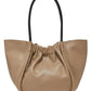 Beige Proenza Schouler Large Ruched Tote with gathered design and black handles, isolated on a white background.