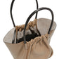 Beige Proenza Schouler Large Ruched Tote with black handles, an open top, and a visible inner pouch, photographed on a white background.