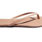 A close up of a Tkees Lily Nudes sandal from the Tkees Nude collection.