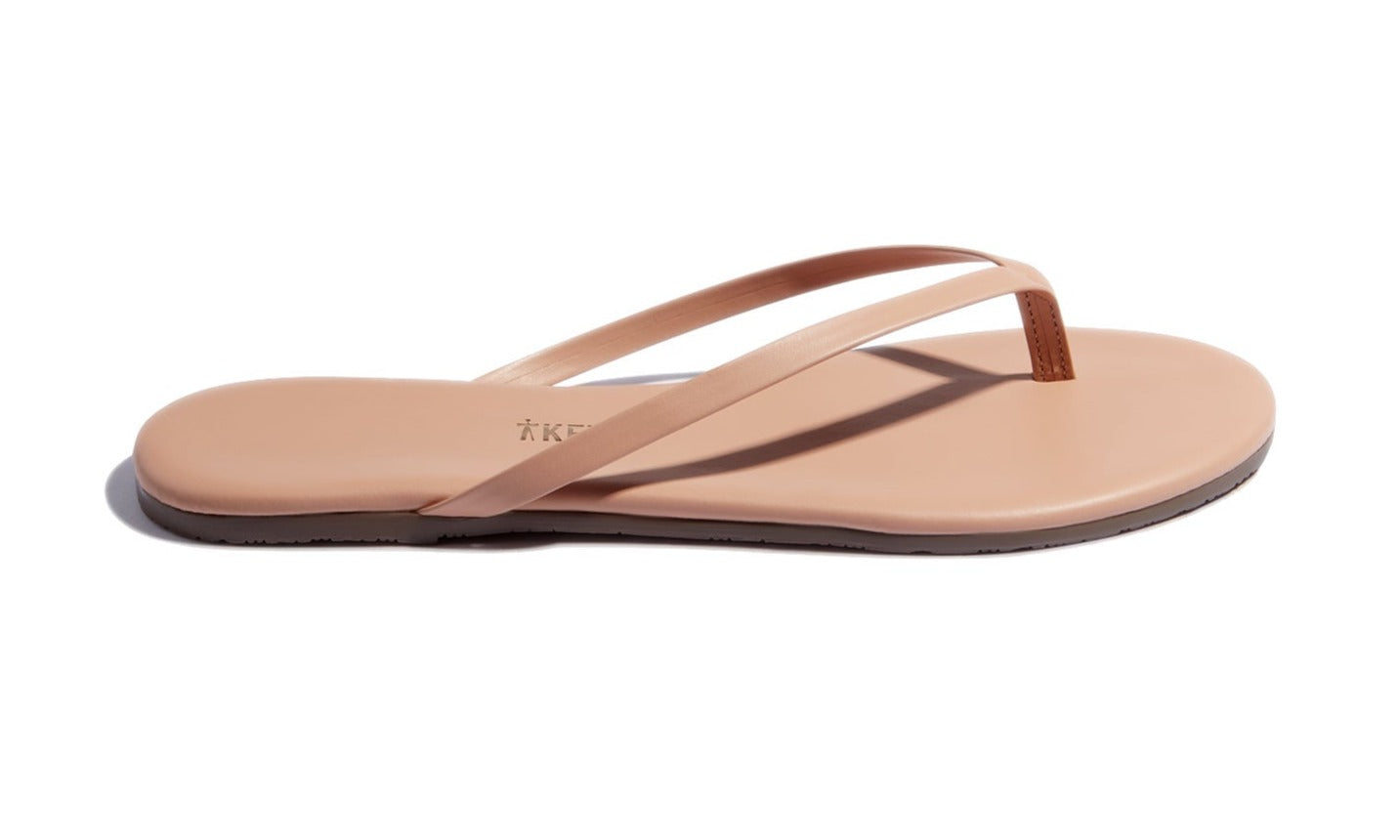 A close up of a Tkees Lily Nudes sandal from the Tkees Nude collection.