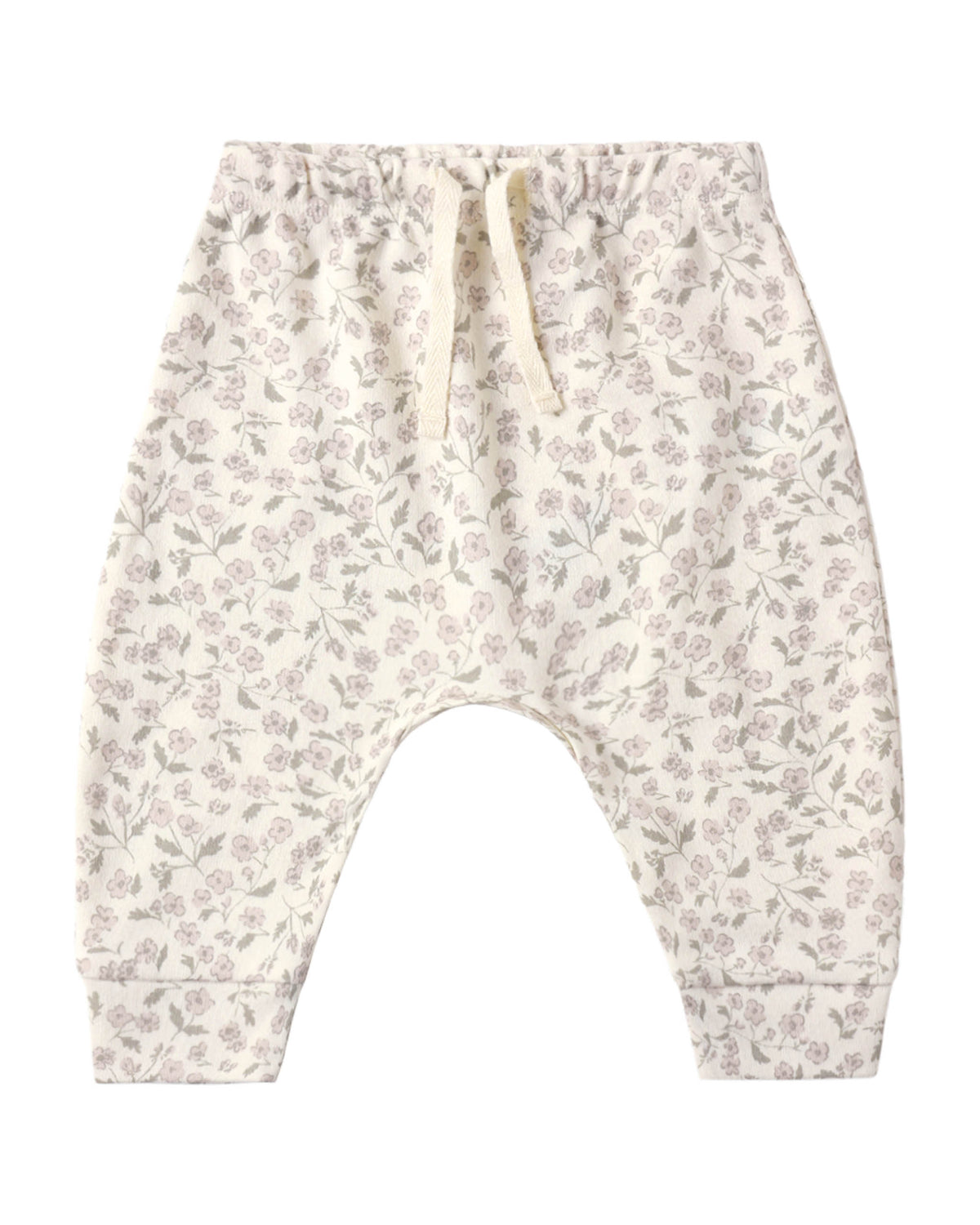 The Quincy Mae Baby and Kids’ Drawstring Pant, shown on a white background, features a cream color with an all-over light purple floral print. These pull-on pants are made from soft organic brushed jersey and include an elastic waistband with a matching cream drawstring.