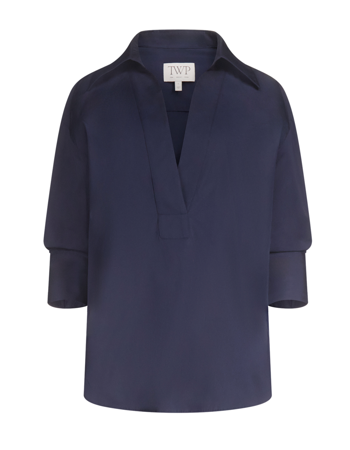 TWP Polo Shirt in navy blue featuring long sleeves, a deep V-neck, wide collar, and cuffed sleeves displayed on a plain white background.
