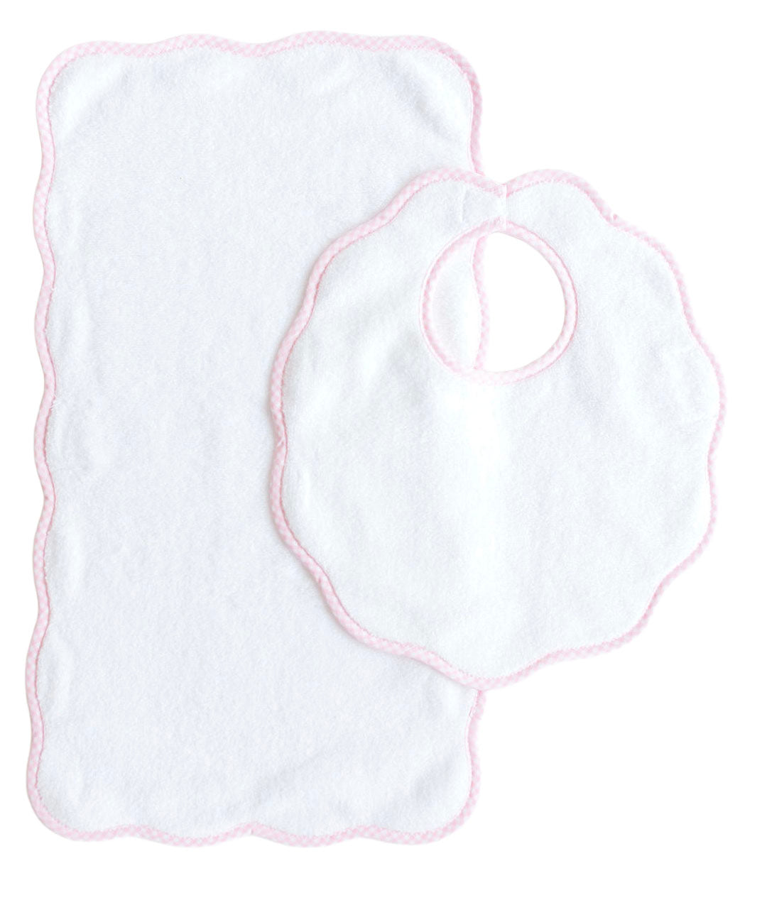The Terry Tots Bib & Burp Set features a white scalloped-edge bib and matching burp cloth with delicate pink trim, displayed on a white background—an ideal choice for adding both style and practicality to feeding time.
