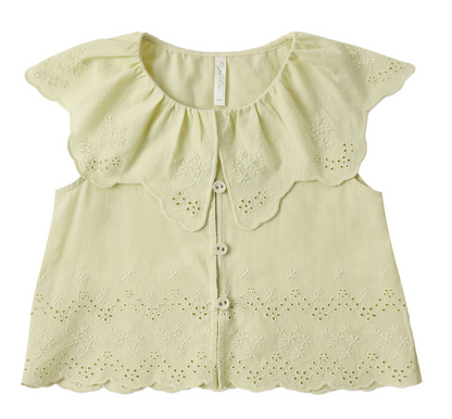 The Girls' Remi Blouse by Rylee & Cru features a light yellow hue, oversized collar, button-down front, and scalloped embroidered eyelet edges, shown against a white background.