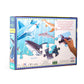 A child's hand is holding a box of Eeboo Love of Sharks 100 Piece Puzzle jigsaw puzzles.