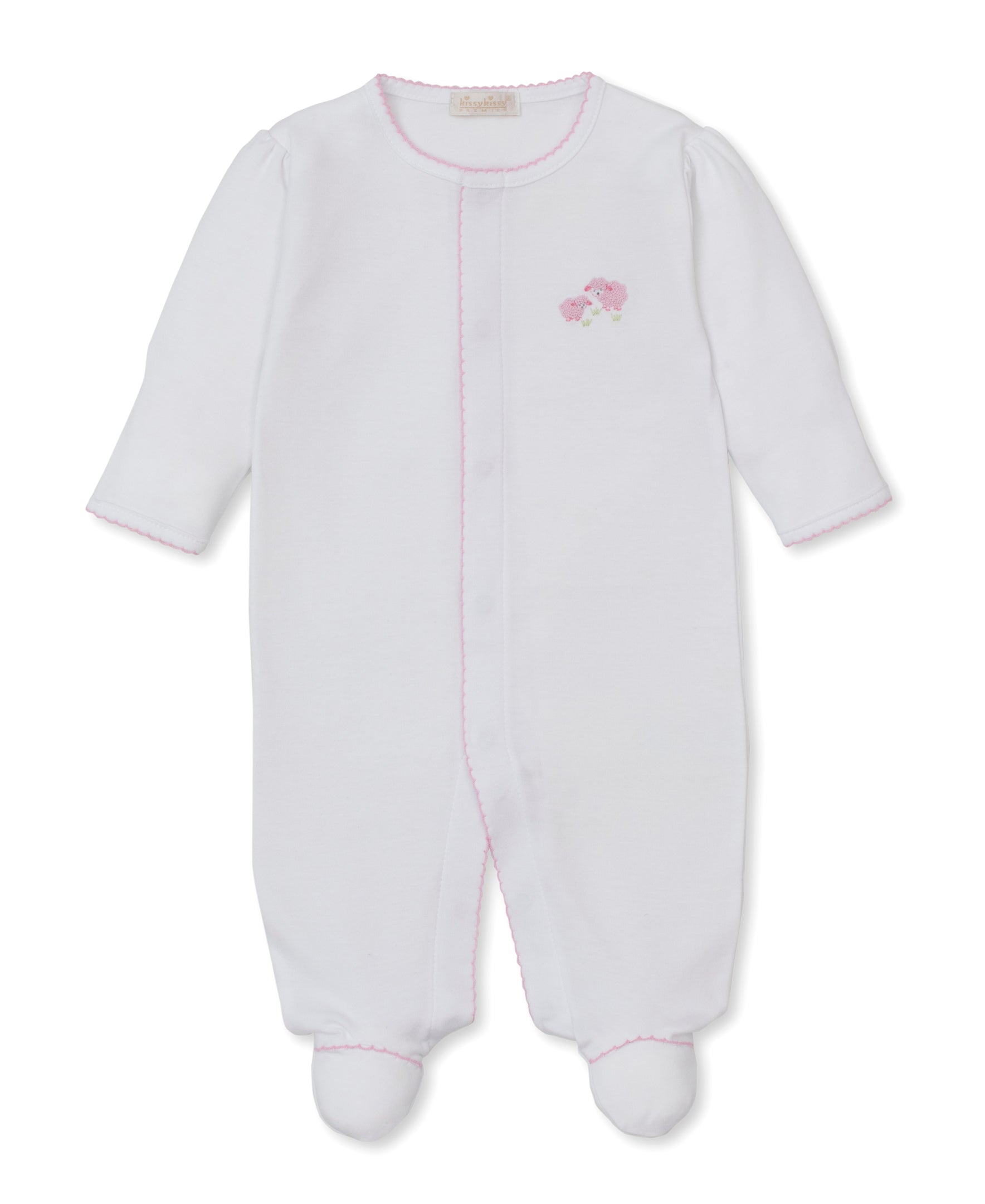 The Kissy Kissy Baby Premier Sweet Sheep Footie is a white long-sleeve footed onesie from the Sweet Sheep Collection, crafted from soft Peruvian cotton. It features delicate pink stitching and small pink flower hand embroidery on the left chest.