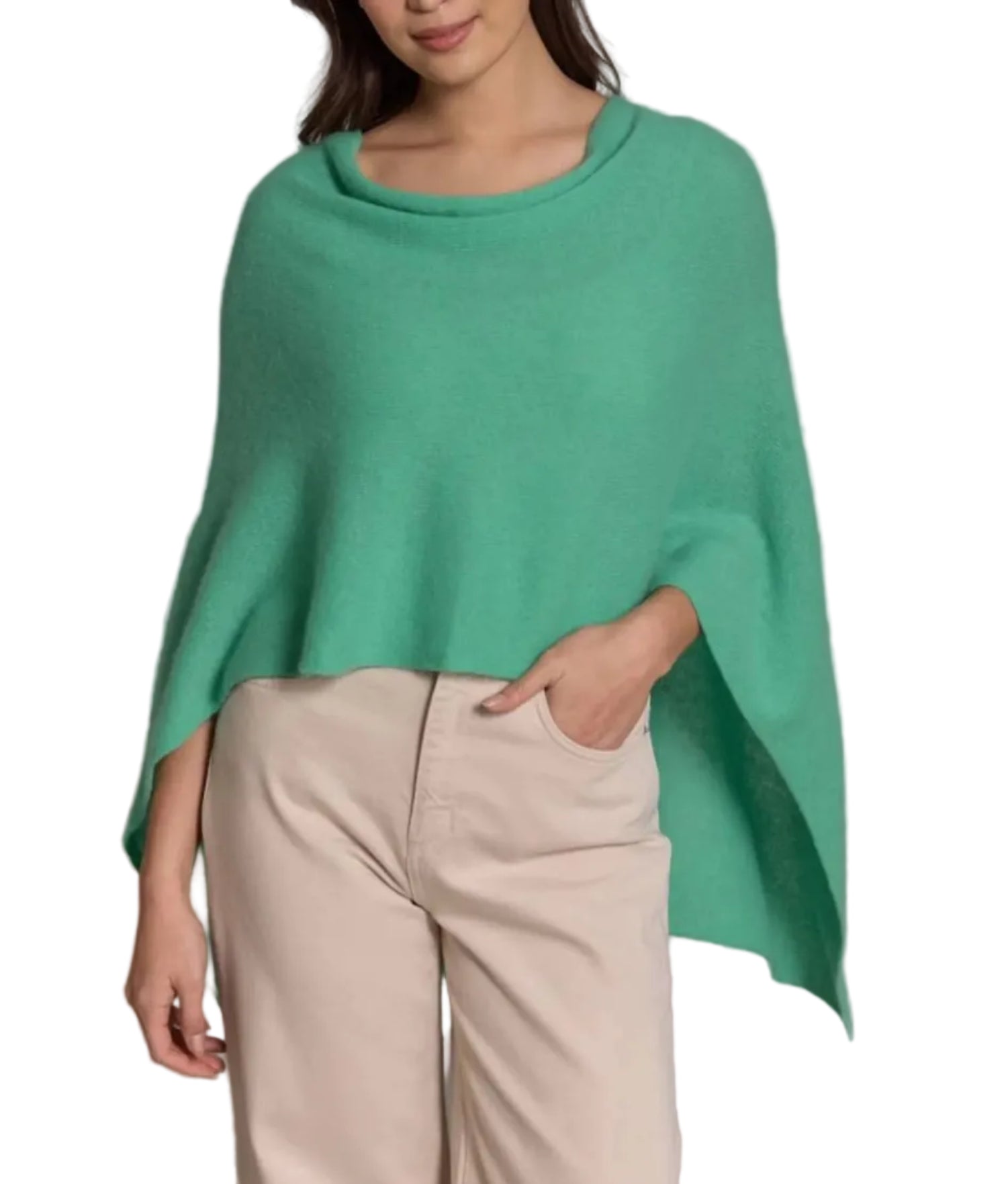 A person wears the Alashan Cashmere Cashmere Dress Topper Poncho—a relaxed, green poncho-style top—paired effortlessly with beige pants, standing against a white background.