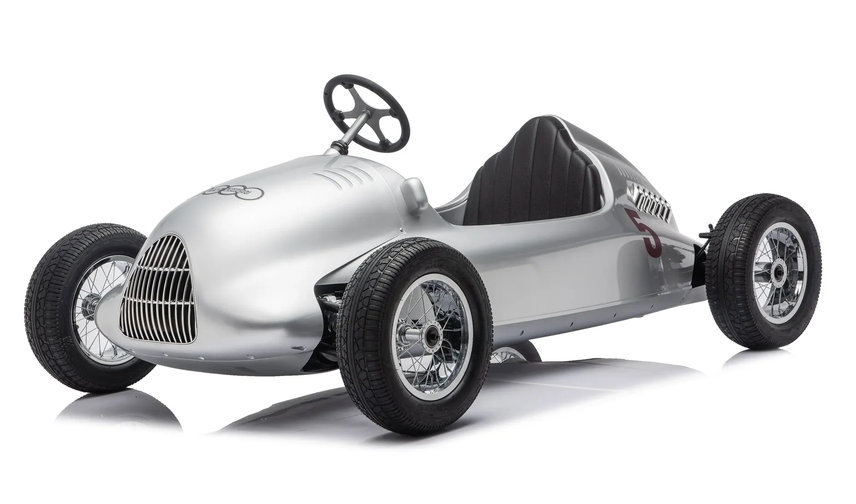 The Freddo 24V Audi Union Typ D Ride-On, a silver single-seat vintage pedal car featuring exposed wheels, spoked rims, and a signature front grille—evoking the style of a classic collector-grade ride-on—is shown from a front side angle against a white background.
