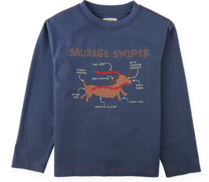 The Boys’ Myron Graphic Tee Dog by Gingersnaps is a navy long-sleeve t-shirt for boys, featuring quirky cartoon illustrations of a dachshund with playful labels like “Sausage Swiper,” “Wiggly Waggler,” and “Sausage Disguise”—a fun and unique addition to any kid’s wardrobe.