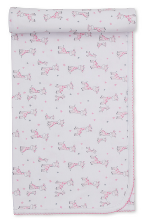 White Pima cotton baby blanket featuring pink and gray cartoon giraffes, stars, and scalloped pink trim, partially rolled at the top—an adorable addition to your nursery from the Kissy Kissy Just Giraffes Printed Blanket collection.