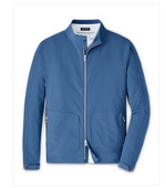 The Peter Millar Contour Jacket is an ultra-lightweight blue zip-up, featuring two front pockets and a high collar, ideal for active pursuits, displayed on a white background.