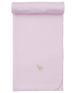 The Kissy Kissy Premier Noah's Ark Blanket with Hand Emb. is a light pink Pima cotton baby blanket featuring a small embroidered bear and boat near one corner, neatly rolled at the top edge.