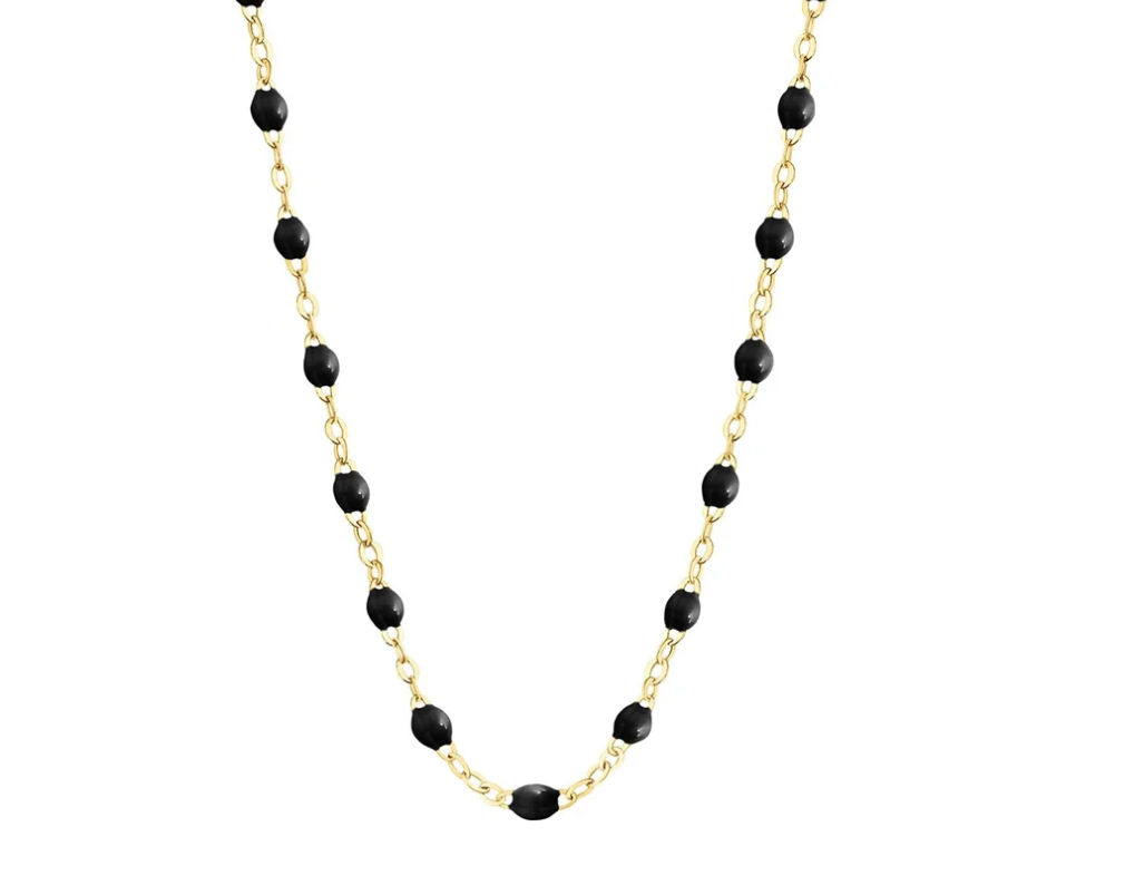 The Gigi Clozeau Classic Gigi Necklace 19.7", made from 18 carat Yellow Gold, showcases black beads intricately spaced throughout, capturing the timeless elegance synonymous with Gigi Clozeau design.