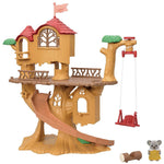 The Calico Critters Adventure Tree House Gift Set features a plastic treehouse toy with a slide, swing, balcony, a small gray animal figure, and a log accessory—all displayed against a white background. Part of the Adventure Tree House collection by Calico Critters, this delightful playset is ideal for imaginative family adventures.