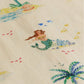The Baby Girls' Flynn Shirt by Arsene & Les Pipelettes features a playful mermaid, palm tree, fish, and island print on light beige fabric—perfect for little ones.