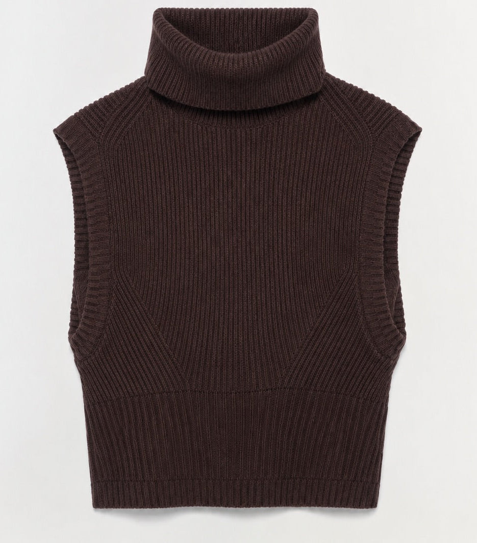 The Simkhai Maple Top is a sleeveless, dark brown ribbed turtleneck sweater vest displayed flat against a light background, highlighting its classic sleeveless knit design.
